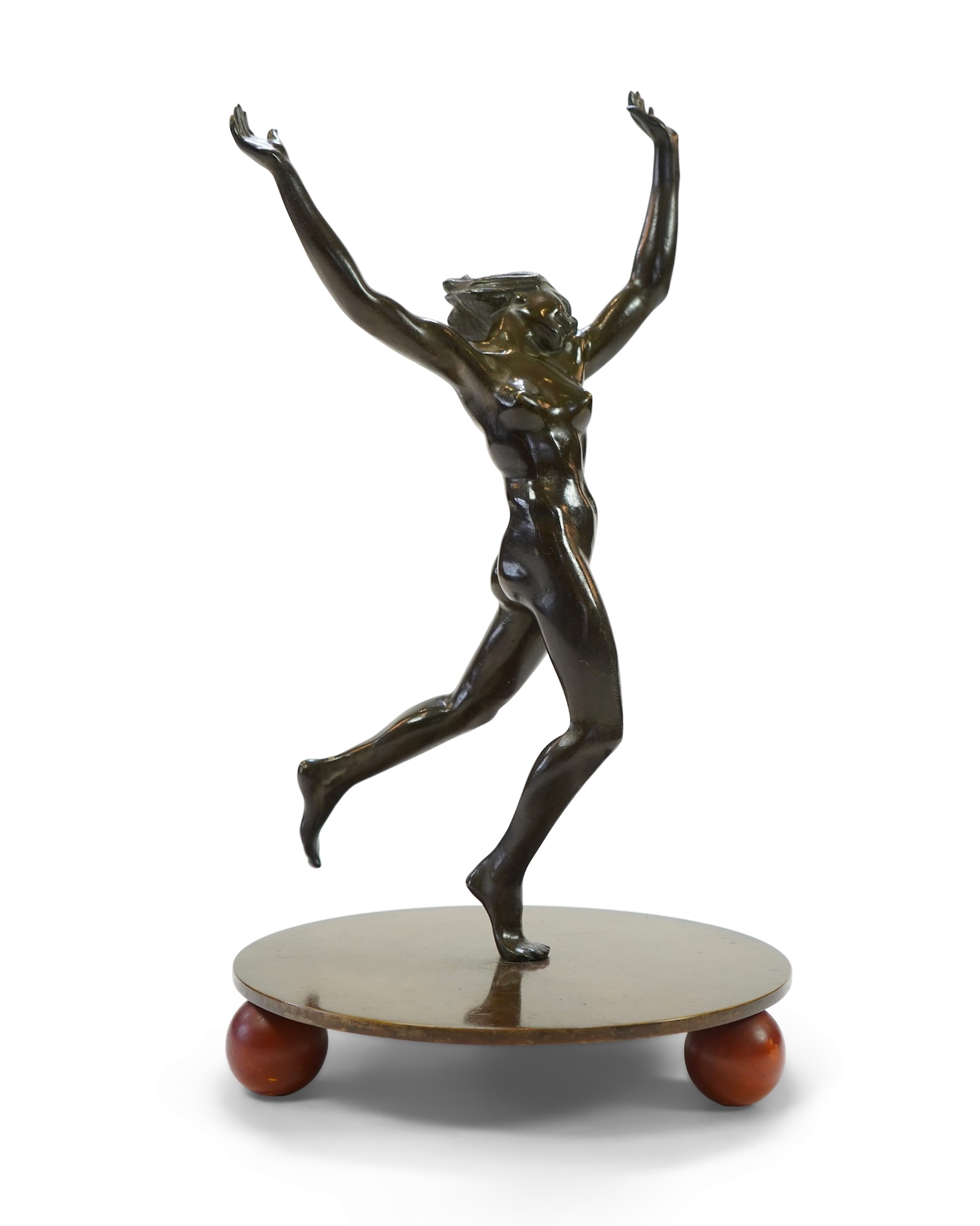 An Art Deco Austrian patinated bronze of a nude female dancer in the manner of Otto Hafenrichter
